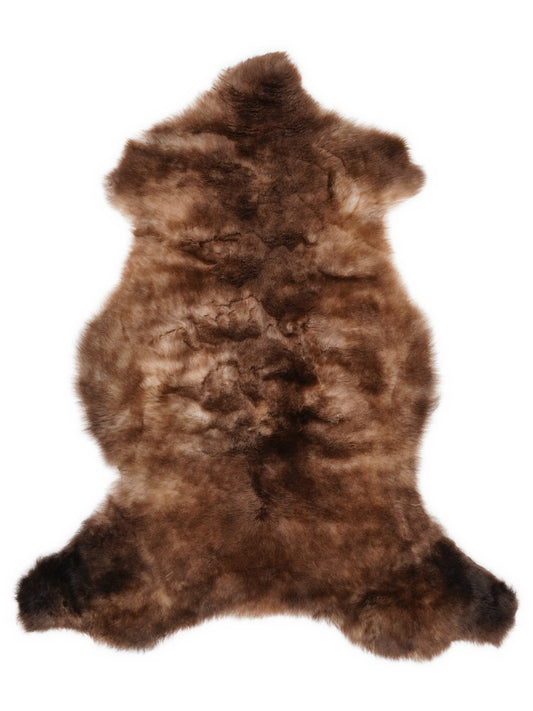 Mehrfarbiges britisches Lammfell, ca. 110 × 60 cm, von oben fotografiert: genau das Fell, das Sie erhalten